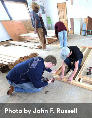 Steamboat Springs Carpentry Students work together to frame a wall. Photo by John F. Russell.